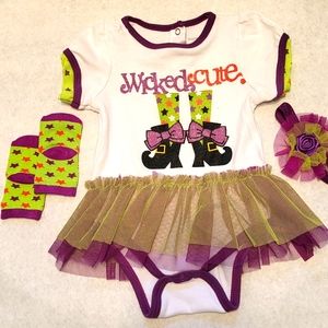 "Wicked cute" onesie with attached tutu, matching socks & hair accessory